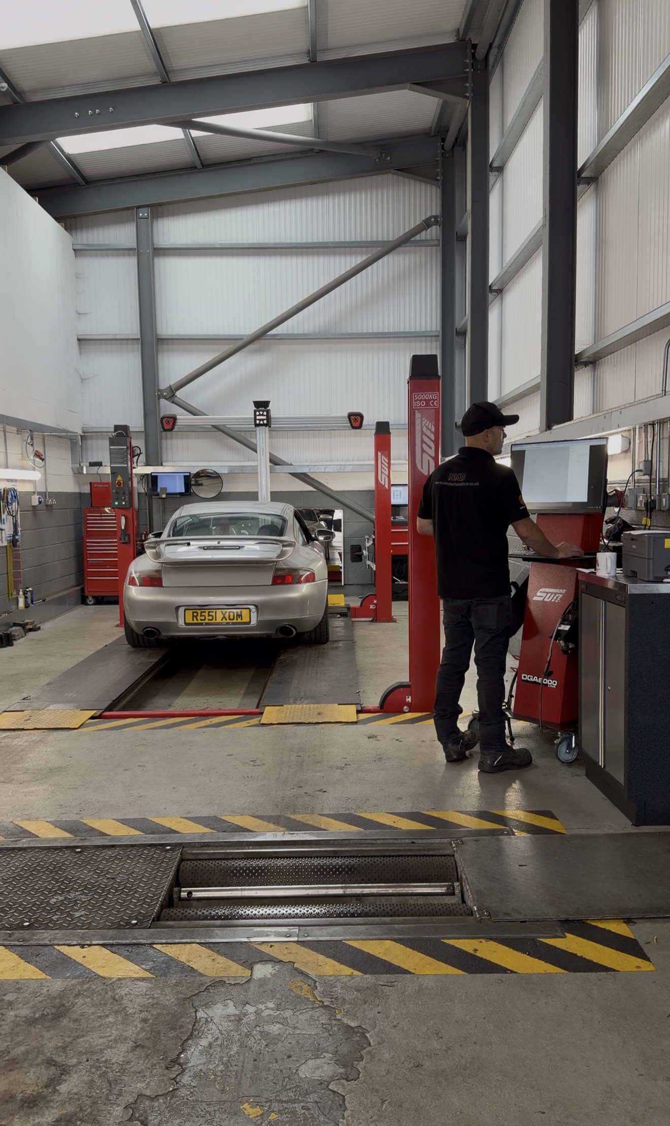 Vehicle being checked during MOT at NMD Automotive