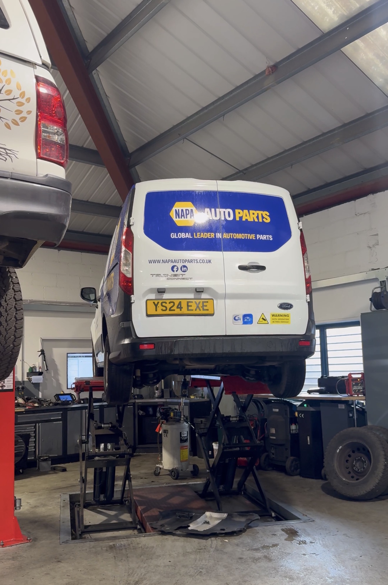 Commercial vehicles being maintained at NMD Automotive Whitstable